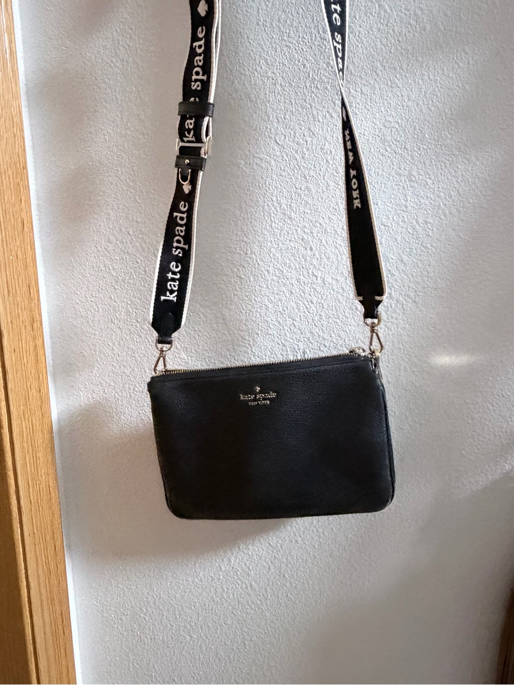 kate spade black leather crossbody with branded logo strap - very good condition